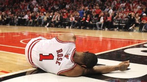 Derrick Rose lays on the floor after tearing his ACL in the 2012-13 season. The Bulls hope to have him for their upcoming playoff run.